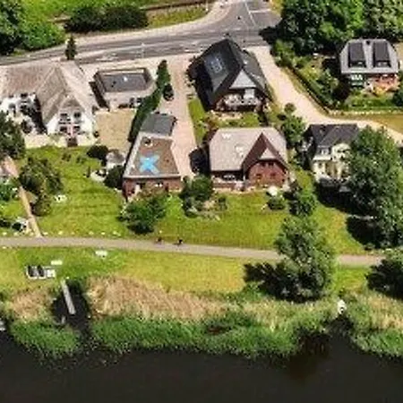 Ferienbungalow Mit Terrasse Und Seeblick In By Interhome *